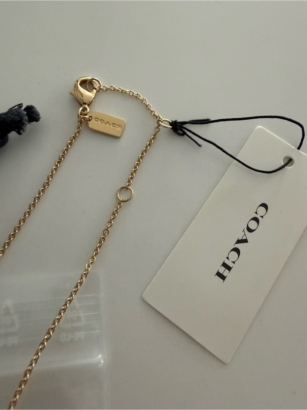 Coach Two-Tone Puffy Heart Pendant Necklace in Gold and Silver - Picture 5 of 6